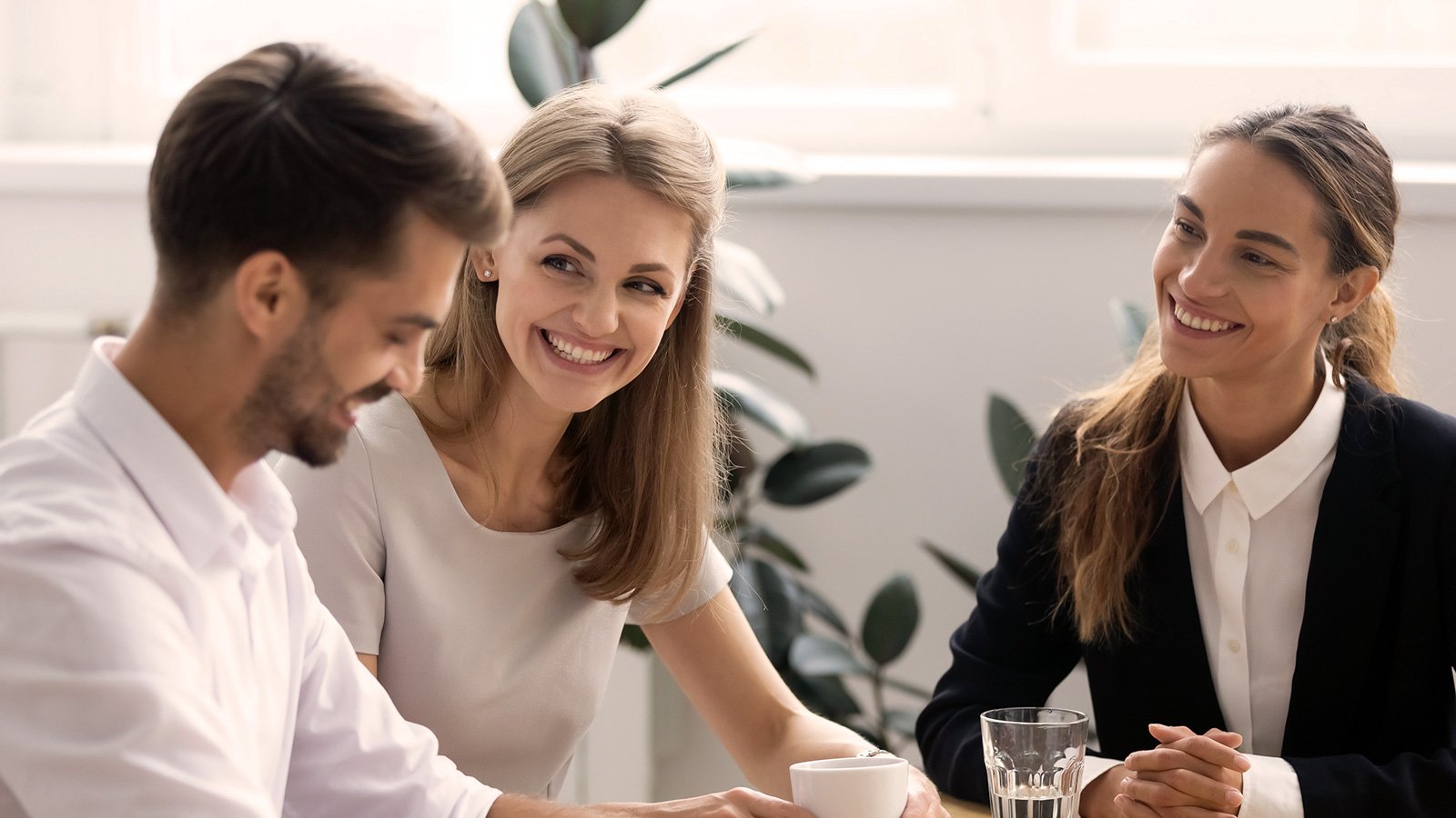three-people-in-a-meeting_DT-133950327