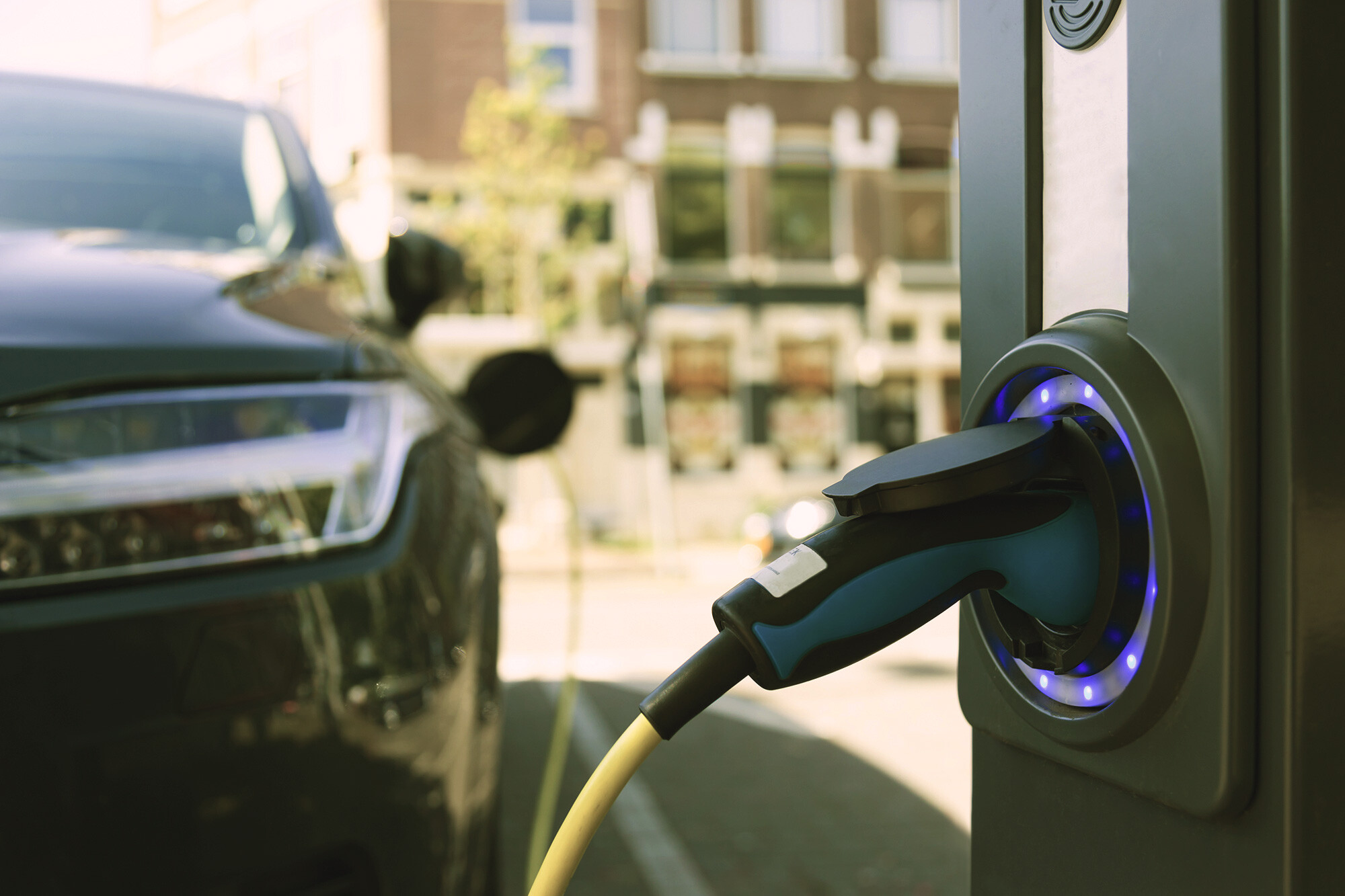 electric-car-charging_dreamstime-106847866